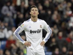 Cristiano Ronaldo compíte con Messi por el trofeo al máximo goleador de la temporada en la Liga española. AP  /