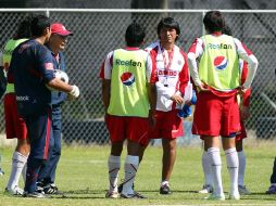 El entrenador y jugadores del Rebaño en un entrenamiento. MEXSPORT  /