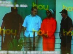 Imágenes de televisión muestran a Kalimba con traje carcelario de color anaranjado. ESPECIAL  /