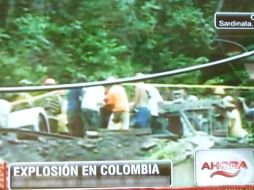 Al mediodía la televisora Caracol emitía las primeras imágenes del rescate de víctimas. ESPECIAL  /