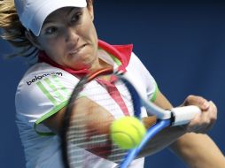Justine Henin se retira por segunda ocasión a los 28 años. AP  /