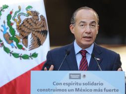 El Presidente Felipe Calderón durante la promulgación de la Ley sobre Refugiados y Protección Complementaria. EFE  /