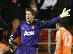 El guardameta del Manchester United se retirará al término de la temporada. AP  /