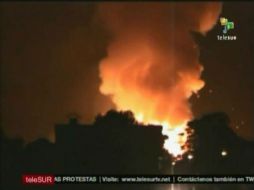 Imágenes del  incendio que desató una serie de explosiones. AFP  /