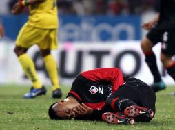 Édgar Pacheco, del Atlas, se duele de una falta, en el partido donde su equipo perdió el invicto ante al América. MEXSPORT  /