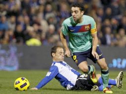 Xavi Hernández en el duelo ante el Hércules. EFE  /