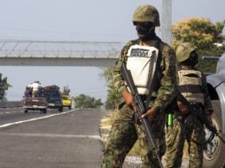 La Sedena justifica la acción diciendo que militres defendían su integridad y la de la comunidad.  AFP  /