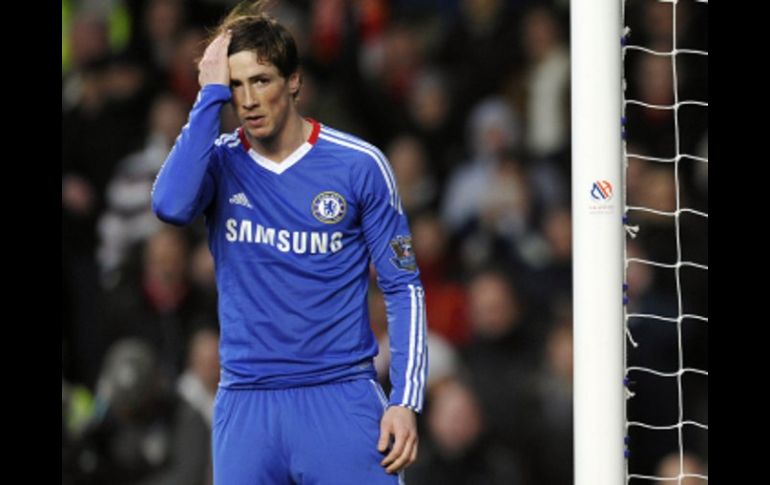 Fernando Torres no pudo ante su anterior equipo el Liverpool. AFP  /