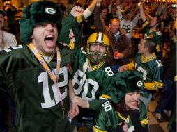 Los aficionados de los Empacadores de Green Bay festejan el campeonato de su equipo. AP  /