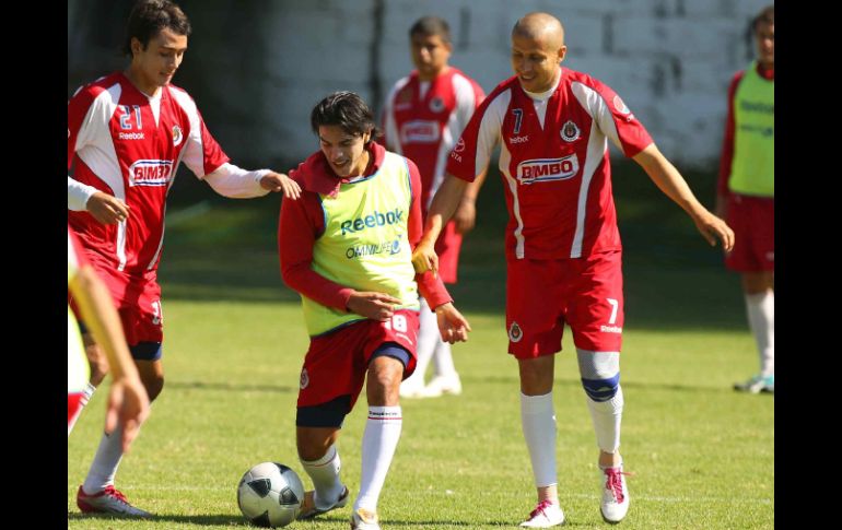 Báez (centro), Christian Pérez y Adolfo Bautista durante la práctica. MEXSPORT  /
