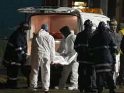 Peritos forenses, militares y policías federales trabajan en la zona donde ocurrieron los hechos. EFE  /