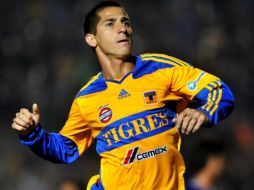 El delantero Danilo Verón de Tigres celebra una anotación ante Cruz Azul. EFE  /