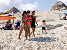 El beneficio que deja la visita de turistas casi no se nota, pues su gasto en México es muy bajo. NTX  /