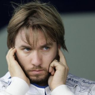 Heidfeld firma por Lotus Renault
