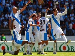 Los jugadores del conjunto Camotero festejan la anotación de Borja con la que vencieron a Jaguares. MEXSPORT  /