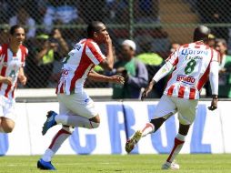 El jugador del Necaxa festejando sus dos anotaciones. MEXSPORT  /