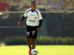 El jugador rojinegro asegura que en el equipo aún preocupa la situación del descenso. MEXSPORT  /