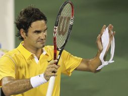 Roger Federer festeja su victoria de los cuartos de final del torneo de Dubai. EFE  /