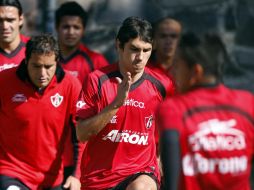 Flavio Santos, durante un entrenamiento del club rojinegro. MEXSPORT  /