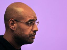 El hijo del líder libio Muamar Gadhafi dijo que sus fuerzas estaban moderando las luchas contra los rebeldes. AP  /