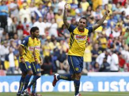 Daniel Montenegro celebrando una anotación en la fecha ocho del torneo Clausura 2011. EFE  /