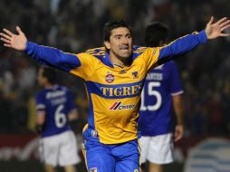 Héctor Mancilla festejando su anotación ante Puebla. MEXSPORT  /