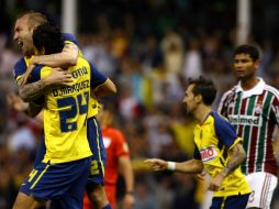 Los americanistas Matías Vuoso y Dani Márquez celebran el gol de la victoria sobre el Fluminense. MEXSPORT  /