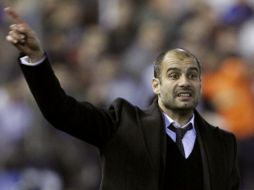 Josep Guardiola, asistió al partido ante el Valencia a pesar de sus molestIas. AP  /