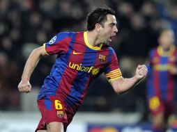 Xavi encaminó la victoria anotando el segundo gol del Barcelona sobre Arsenal. AFP  /