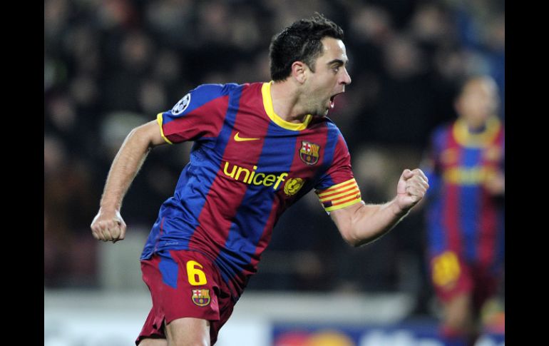 Xavi encaminó la victoria anotando el segundo gol del Barcelona sobre Arsenal. AFP  /