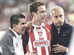 “Cubo” Torres (centro) fue el primero en salir expulsado de Chivas. MEXSPORT  /