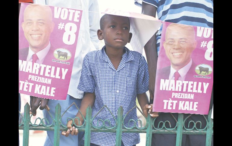 Un menor, durante un mitin del candidato presidencial Michael Martelly, en Hinche. REUTERS  /