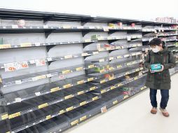 Tras el sismo y tsunami que devastaron Japón, el desabasto es generalizado. ARCHIVO  /