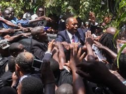 El expresidente de Haití Jean Bertrand Aristide regresó hoy a su país tras siete años de exilio en Sudáfrica. AP  /