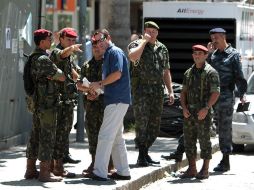 Militares brasileños y agentes estadounidenses preparan la seguridad durante la visita de Barack Obama en Río de Janeiro. EFE  /
