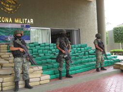 Los ingresos del narco en 2010 ascendieron a casi 14 mil millones de dólares en México, según el organismo. ARCHIVO  /