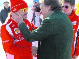 Alonso (izq.) y Luca Cordero Di Montezemolo, presidente de Ferrari, tienen una gran comunicación en el equipo. GETTY IMAGES SPORT  /