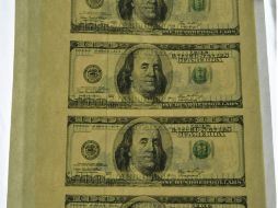 La moneda nacional cierra en 12.07 por dólar. EFE  /