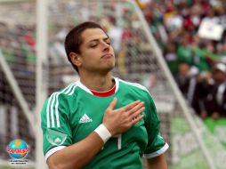'Chicharito' festeja una de sus anotaciones al cuadro guaraní. MEXSPORT  /