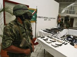 Para Felipe Calderón, controlar el tráfico de armas es otro de los asuntos muy importantes en la lucha contra el narcotráfico. ARCHIVO  /
