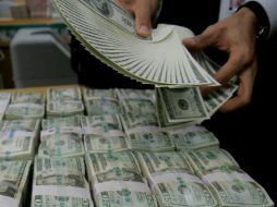 La  compra en el AICM está en 10.83 pesos. ARCHIVO  /