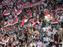 Partidarios del presidente sirio Bashar al-Assad durante una manifestación en la ciudad de Alepo. REUTERS  /
