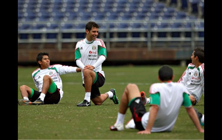 Los jugadores de la Selección mexicana preparándose para el encuentro contra Venezuela. MEXSPORT  /
