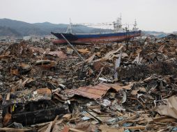 El número de fallecidos por el terremoto y tsunami del 11 de marzo en Japón aumentó hoy hasta los 11 mil 417. AP  /