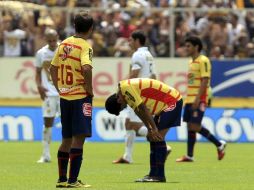Los jugadores de Monarcas de Morelia, durante su último encuentro con Pumas. MEXSPORT  /