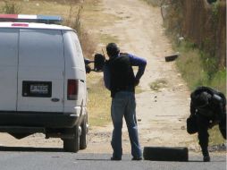 Dos de los tres jóvenes  fueron recapturados en las inmediaciones de un campo de golf por elementos de la Policía del Estado. M. PATIÑO  /