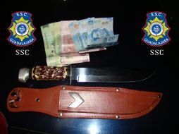 Arma y monto recuperado tras la detención .ESPECIAL.  /