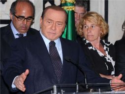 Berlusconi y su partido PDL buscan derogar prohibición del fascismo en Italia. AFP  /