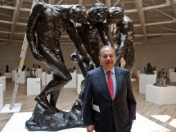 Al ser cuestionado por los reporteros, Slim Helú decidió quedar reservado. AFP  /