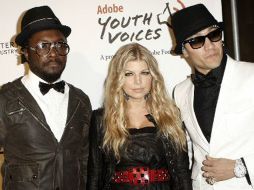 El perfume, creado por la vocalista de Black Eyed Peas, contiene una mezcla de moras y flores de la pasión. AP  /